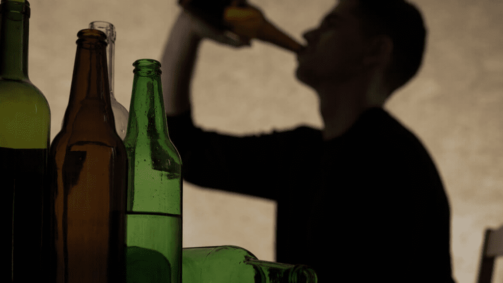 man drinking beer