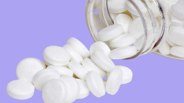 aspirin pills being taken for tinnitus
