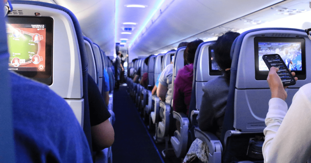 person with tinnitus on airplane