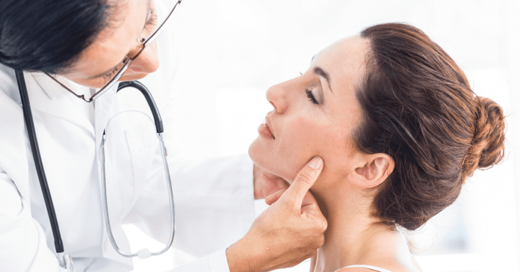 woman at ENT getting screened for somatic tinnitus