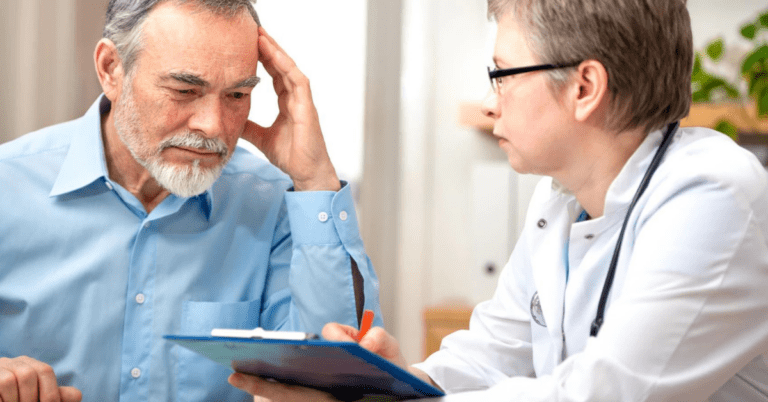 doctor diagnosing patient with tinnitus