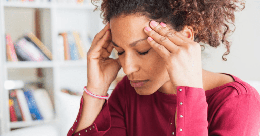 woman with tinnitus migraine