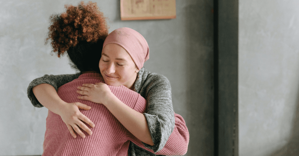 Two women hugging