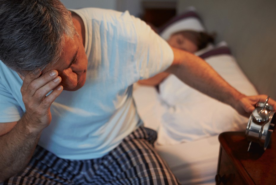 man getting out of bed
