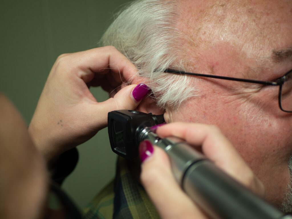 patient getting an ear exam