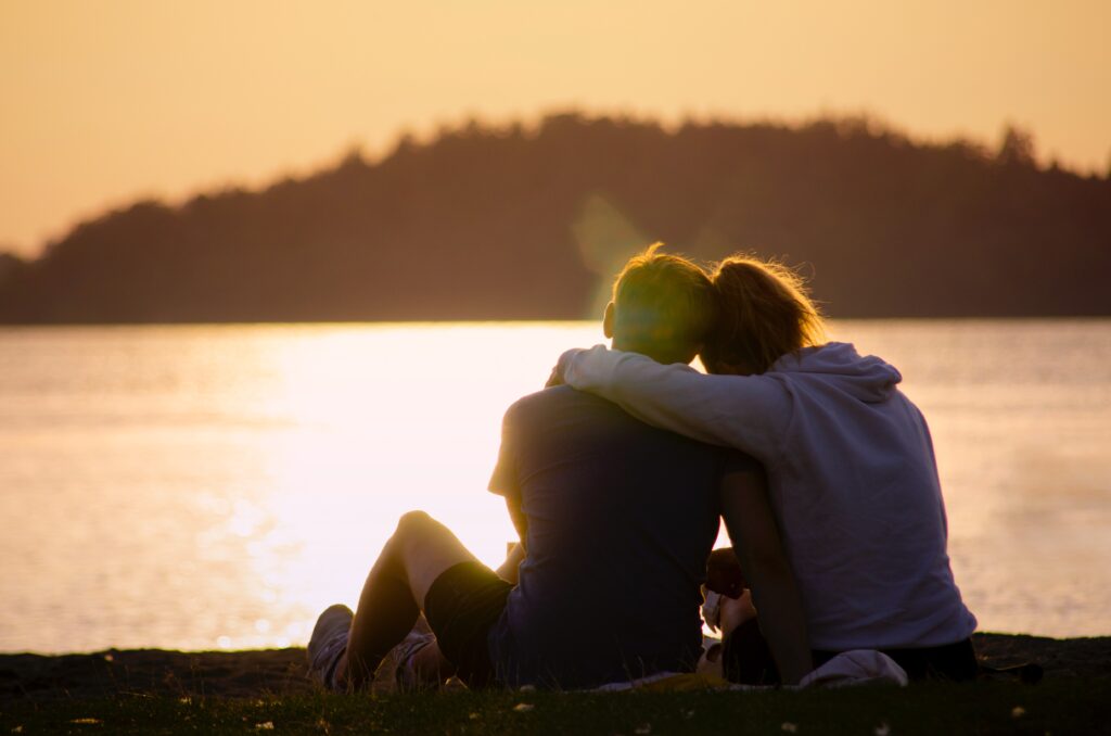 couple with arms around each other