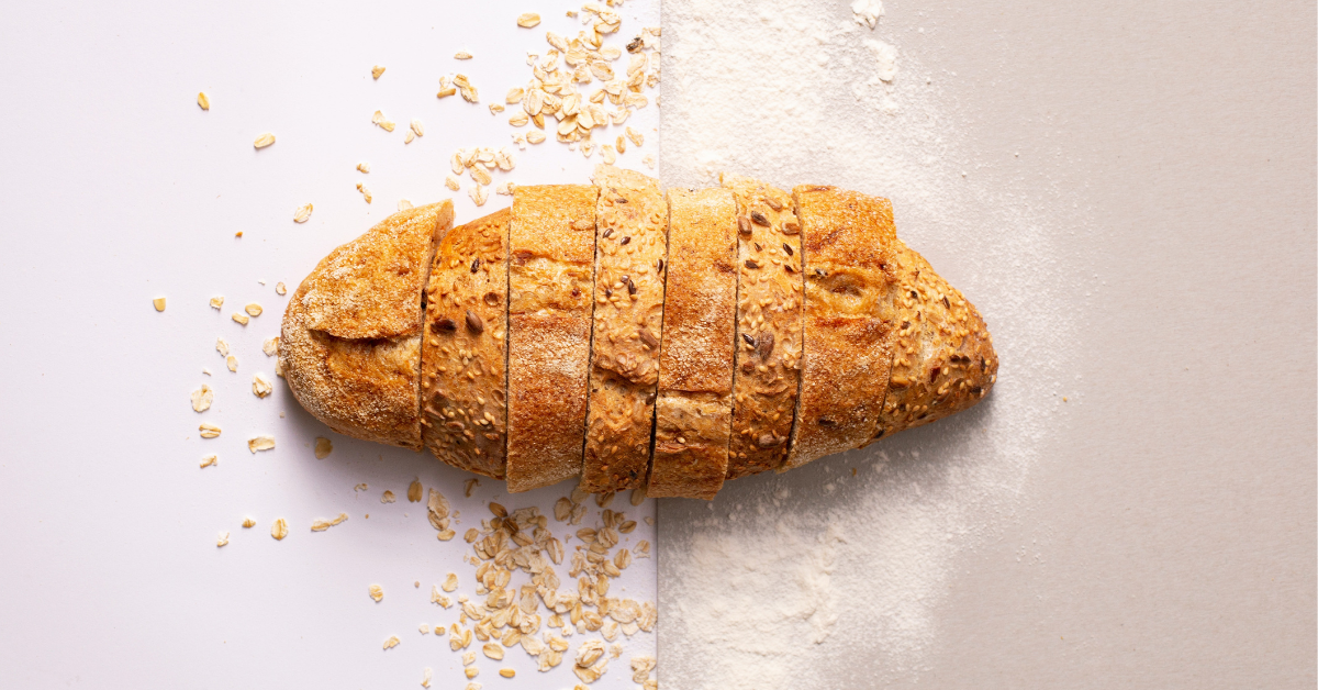 Loaf of bread on a counter cut into slices