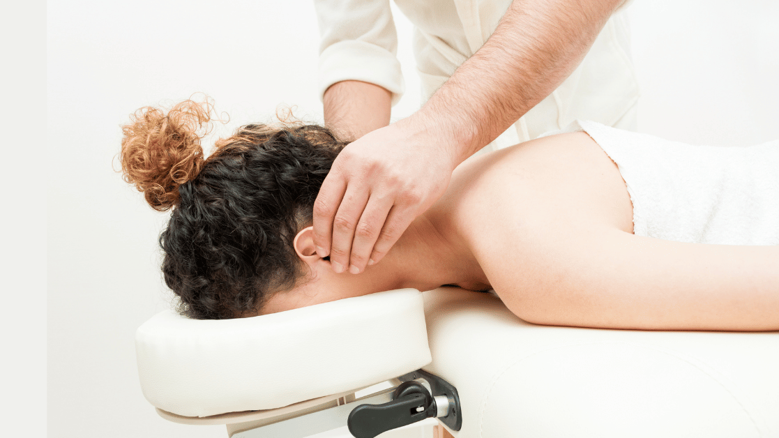 Woman getting a neck massage