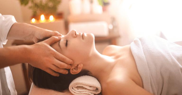 Woman getting a neck massage for tinnitus relief