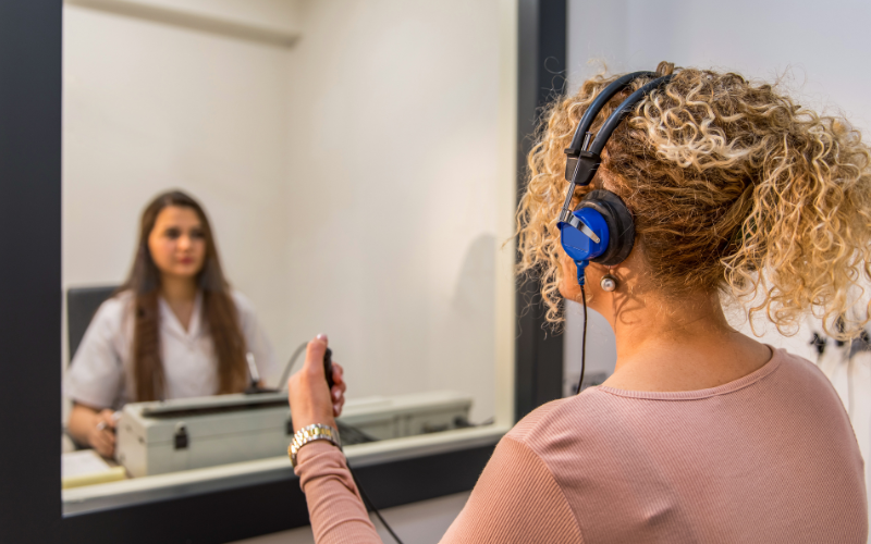 Woman taking a hearing test