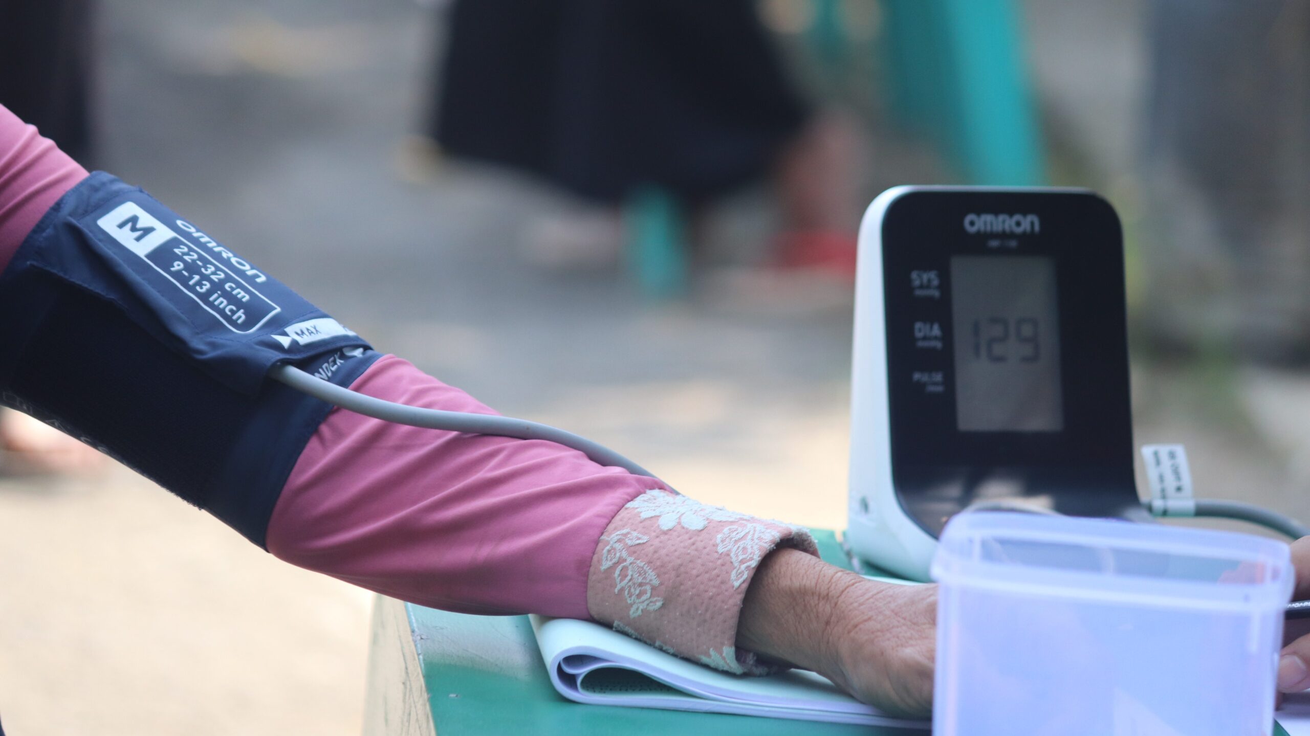 Person taking their blood pressure