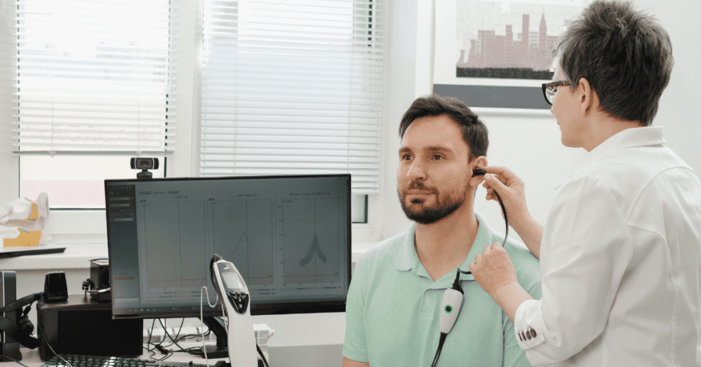 Man getting an ear exam