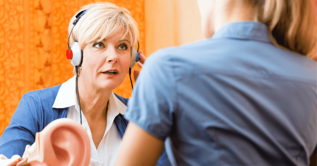 Woman getting a hearing test done 