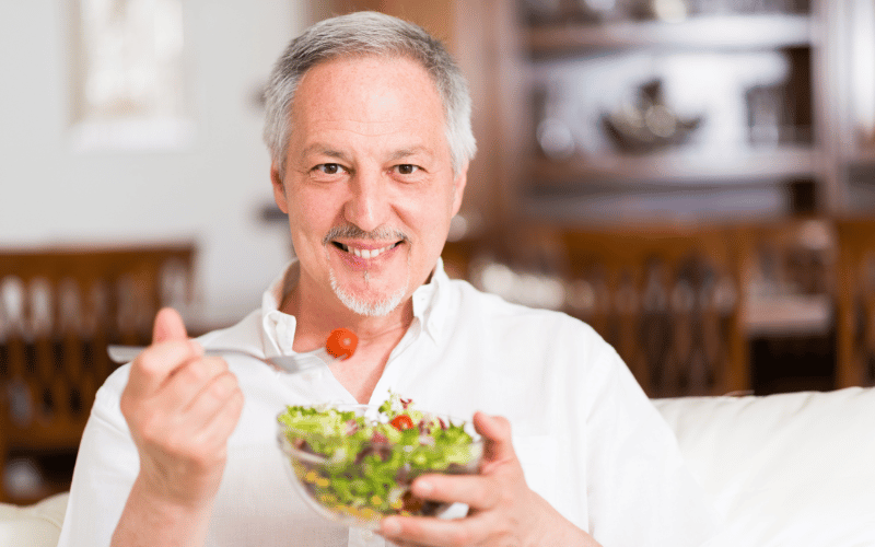 Man eating a salad