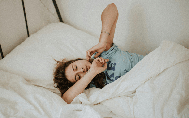 Woman laying in bed