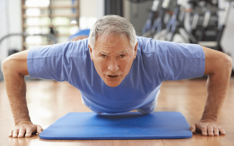 Man doing pushups and practicing self care